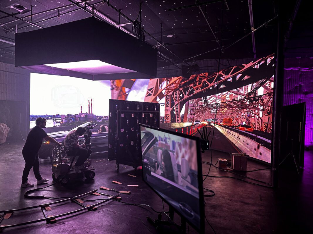 LED wall being used to create realistic reflections for a driving scene